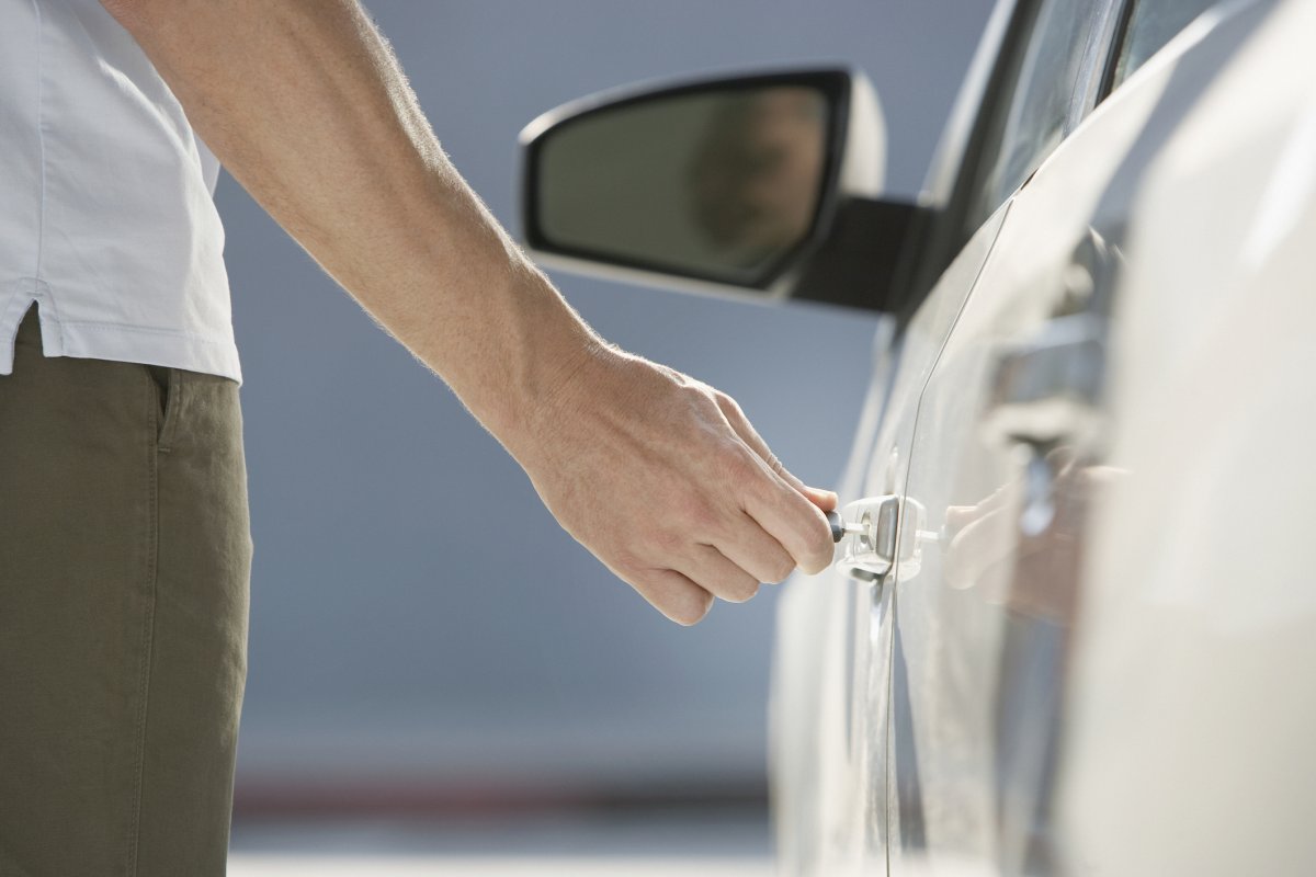 A man opens car door